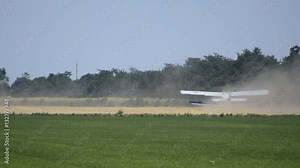 Aircraft agricultural aviation AN-2. The spraying of fertilizers and pesticides on the field with the aircraft.
