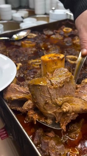 TasteAtlas on Instagram: "@tasteatlas presents Dana İncik Tandır 📍Türkiye 🇹🇷 Dana incik tandır is a traditional Turkish dish made from veal shank, slow-cooked in the tandır style until the meat falls off the bone. Unlike Italian osso buco, which inspired similar preparations, this dish reflects Turkey’s own culinary heritage, where tandır ovens and long, slow braising techniques have been used for centuries. It is typically served with rice, bulgur, or mashed potatoes. Cr