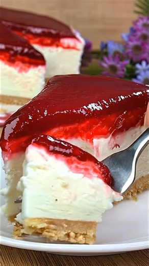 No-Bake Raspberry Cheesecake Ingredients For the Raspberry Layer 200 g raspberries (7 oz | 1⅔ cups) 30 g sugar (1 oz | ⅛ cup) 12 g cornstarch (0.4 oz | about 1 tablespoon) For the Cheesecake Filling 400 g cream cheese (14 oz | 1¾ cups), softened 65 g sour cream (2.3 oz | ¼ cup) 200 g sugar (7 oz | 1 cup) 1 teaspoon vanilla paste 250 ml heavy cream (8.5 fl oz | 1 cup), cold 8 g gelatin (0.3 oz | about 1 tablespoon) For the Crust 140 g biscuits (5 oz | 1¼ cups), finely crushed 15 g vanilla sugar (