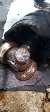 Repair CV axle on a 2010 Camry. The grease inside the boot looked like mud.