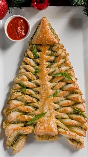 295K views · 418 reactions | Creamy walnut pesto + puff pastry = instant holiday joy! ✨ @ivskitchen Sponsored by California Walnuts Find the recipe here: https://tasty.co/recipe/walnut-pesto-puff-pastry-tree | Tasty | Facebook