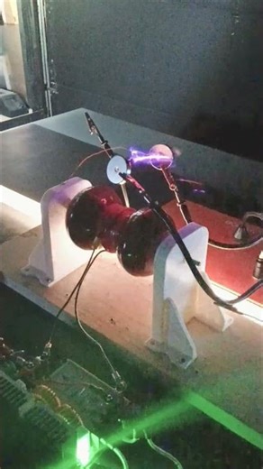 Beat frequency in bipolar peanut tesla coil AC from DC conversion