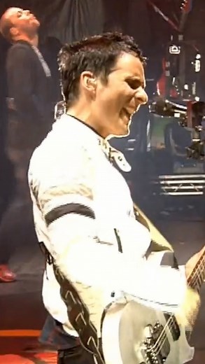 MUSE on Instagram: "Absolution Track Eleven - The Small Print A rare instance of Matt and Chris sharing lead vocal duties during live performances. A third vocalist features in the studio version of the song at around 2:51... anyone know who it is? 🐾"