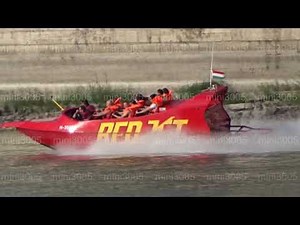 Tourists ride on speedboat on the Danube River in Budapest, Hungary