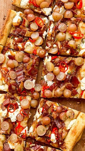 Ronny Lvovski on Instagram: "Grilled Flatbread with California Grapes, Beef Bacon, Goat Cheese and Caramelized Onions… It may not be your usual combination of toppings but everything works together so well. It’s savoury, spicy, crunchy, and you get an unexpectedly juicy sweetness in every bite thanks to the @GrapesFromCA. And the best part is you can par-grill the dough and prepare all the toppings in advance to quickly assemble everything for an after-school snack or game-day spread #Grapesfrom