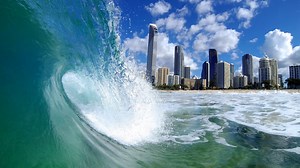 Surfer Catches Waves With Pet Python Around His Neck In Most Australian Video Of The Year