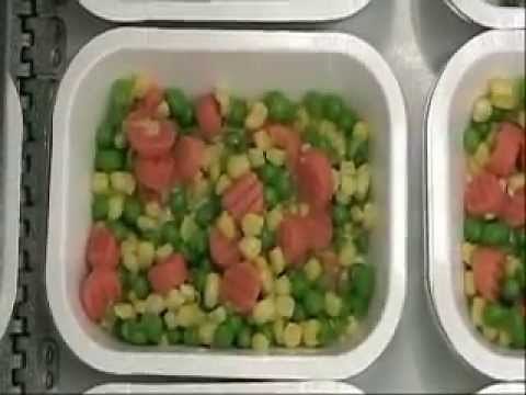 Peas, corn, and carrots with distribution system