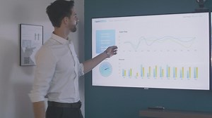 Business man exposing graphs - Free Stock Video