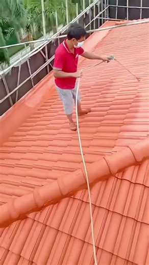 Professional Roof Painting Transforming Tiles with a Fresh Terracotta Finish