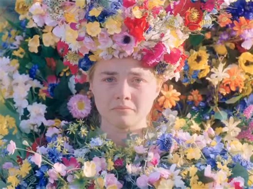 Midsommar is unsettling not because it’s loud, but because it’s bright, intentional, and relentlessly honest about a relationship already falling apart long before the cult enters the picture. The horror isn’t just in rituals or symbolism — it’s in the emotional distance between two people who can’t admit they’ve stopped choosing each other. Dani enters the film carrying grief so heavy it reshapes every room she walks into. She’s fragile, terrified of being “too much,” and desperate for stabilit