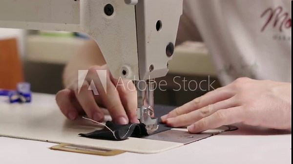 Working on industrial garment machine, flat machine