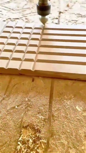 Professional Wood Carving Machine Creating Neat Rectangular Patterns on Wooden Surfaces