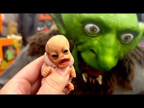 Our alien caterpillar creature is terrified of the Halloween animatronics!