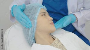 Cosmetic Surgeon Examines Beautiful Woman's Face, Touches it with Gloved Hands, Inspecting Wrinkles for Future Facelift Surgery, Face skin check before plastic surgery, Doctor checks a skin