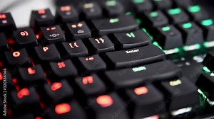 Clicking 'Enter' button on mechanical RGB keyboard close up