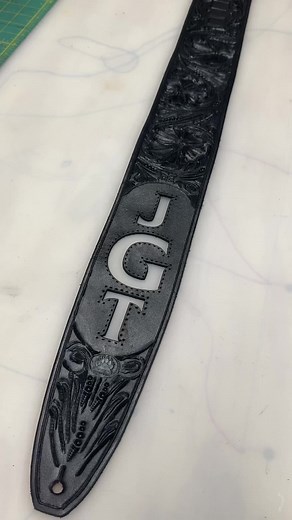Little ASMR adding this 🐊 Inlay🔥. #leather #leathercraft #handtooledleather #febings #tooledleather #guitar #guitarstrap #customleatherguitarstrap #followers➕ #fyp #🔥🔥🔥🔥 #🐄 #5000followers #🐊🐊🐊 #inlays #trainedprofessional #custom #customwork @Bearded Bear Custom Hides @Grant Tomlinson