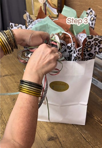 Step 3 - this is how we layer tissue paper for gifts in our boutique. #tissuepaperhack #tissuepaper #giftwrapping #wrapagiftwithme #giftinstyle
