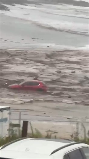 Shocking footage has emerged of cars being washed out to sea in Wye River, as dangerous flash flooding continues to threaten popular holiday hotspots along the Great Ocean Road. SEE THE VIDEOS 👉 https://bit.ly/45eBXVA | Geelong Advertiser