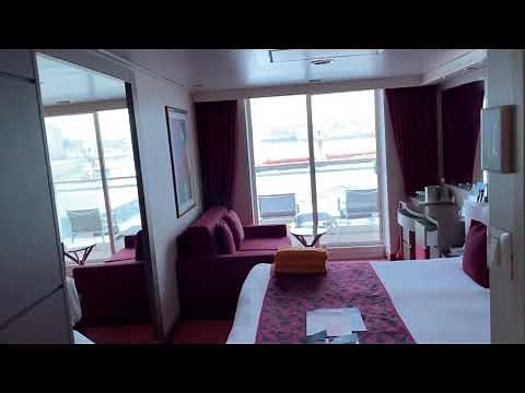 Inside a cabin with a balcony on the MSC Musica