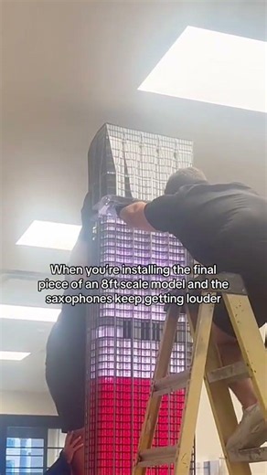 The saxophones getting louder while installing an 8ft scale model 😳