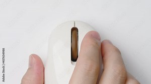 Clicking digital wireless mouse and working on computer at the office. Close up hand on mouse. The concept of using technology for rapid success. Computer lab. Cyber business.4k