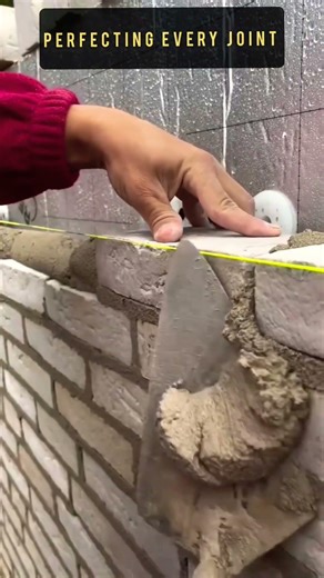 Professional Mason Demonstrates The Art Of Perfect Brick Alignment.