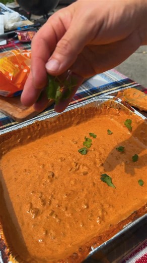 Texas Frito Pie Queso Dip 🧀🌶️ Recipe: -Combine these ingredients in a foil tray: 2 cans no bean chili 2 blocks cream cheese 1 diced jalapeño 8 oz shredded colby jack cheese 1 tbsp chili seasoning -Place on the grill or oven at 350F for 30 minutes. -When everything is soft, stir it up, and return to the heat for 15 more minutes. -Top with fresh cilantro, Fritos, and enjoy with tortilla chips. I got this recipe from @marriedtobbq and it is delicious! #queso #chipsandqueso #cheesedip #cheese #que