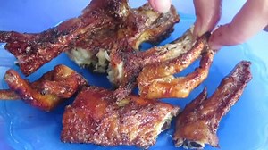 beautiful girl eating roast chicken