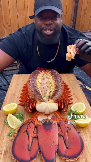 Oversized grilled lobster tail 🦞🔥 #cookingwithstrong #lobster #seafoodtok #giantfood #foodtok #grilltok