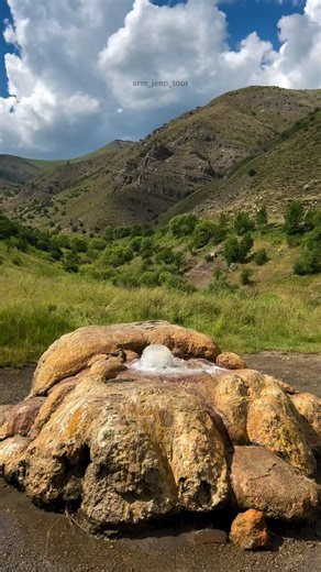 A natural geyser in Armenian mountains