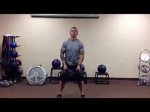 Exercise of The Week - Sandbag Thruster