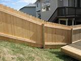 Wood Fence On A Slope Photos