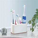 Electric Toothbrush And Toothpaste Holder Photos
