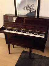 Pictures of Yamaha Cherry Wood Upright Piano