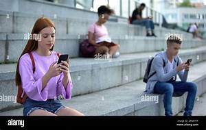 Indonesian students scrolling chatting apps