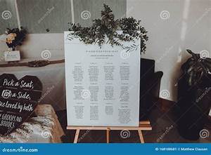 Wedding Seating Chart On The Easel At Light Restaurant Stock Image