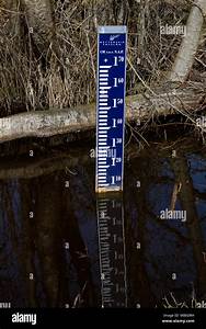 Blue Water Depth Measuring Scale In A Small River Stock Photo Alamy