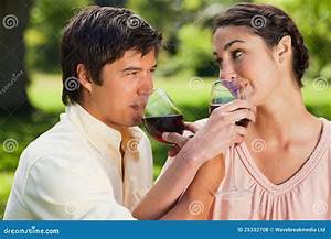 Two Friends Drinking Wine While Linking Arms Stock Photo Image Of