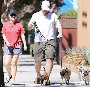 Doing Just Fine Faris Beams As She Walks Her Dogs With Husband