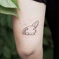 Cute Small Bunny Tattoo