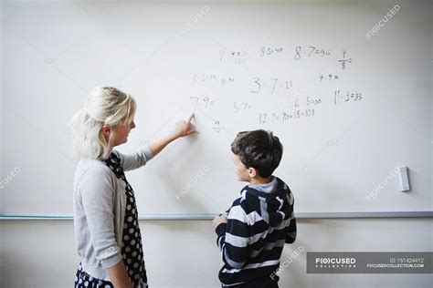 Teacher explaining to students