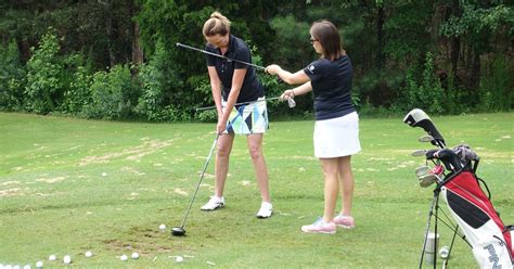 Golf instructor providing individualized instruction
