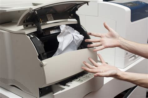 foreign object in printer causing paper jam