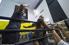 joelle arab vigilante hunter pro wrestlers stands tries shouts him floor he off over