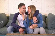 boyfriend girlfriend couch cuddling romantic young teenagers sofa smiling couple happy beautiful rom 20s preview pretty room