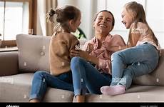 tickling daughters mother couch alamy playing happy little
