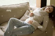 woman drunk young drinking relaxing wine glass stock alamy empty bottles posed alcohol model asleep