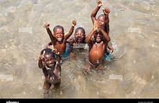 bathing african children lake village tanganyika mahale alamy
