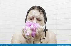 girl soaping woman washing hair preview
