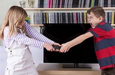 fighting kids tv siblings over control fight remote sibling front stock continually rivalry when do sorting calm tip everyone issue